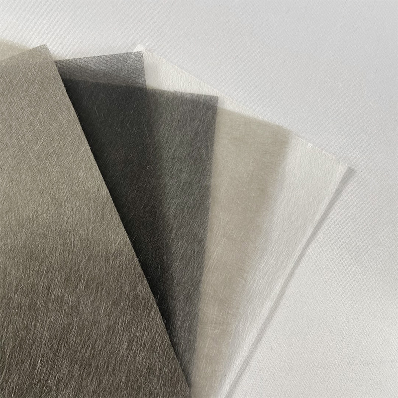 Karbon- og glasshybridfilt/glassfiberduk for vindkraft med elektrisk varmegenerering