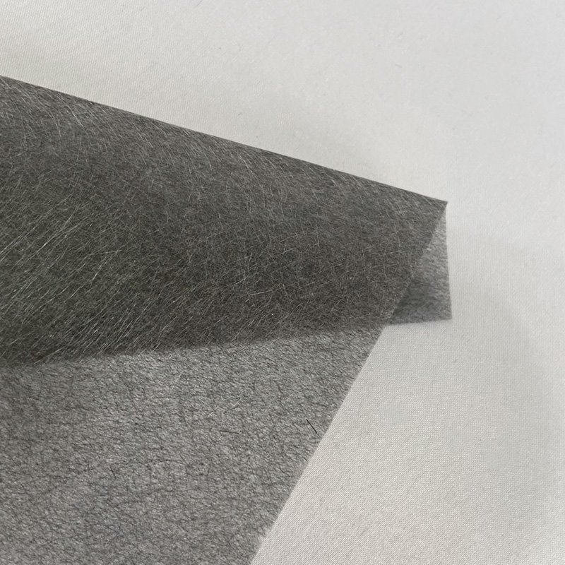 Karbon- og glasshybridfilt/glassfiberduk for vindkraft med elektrisk varmegenerering